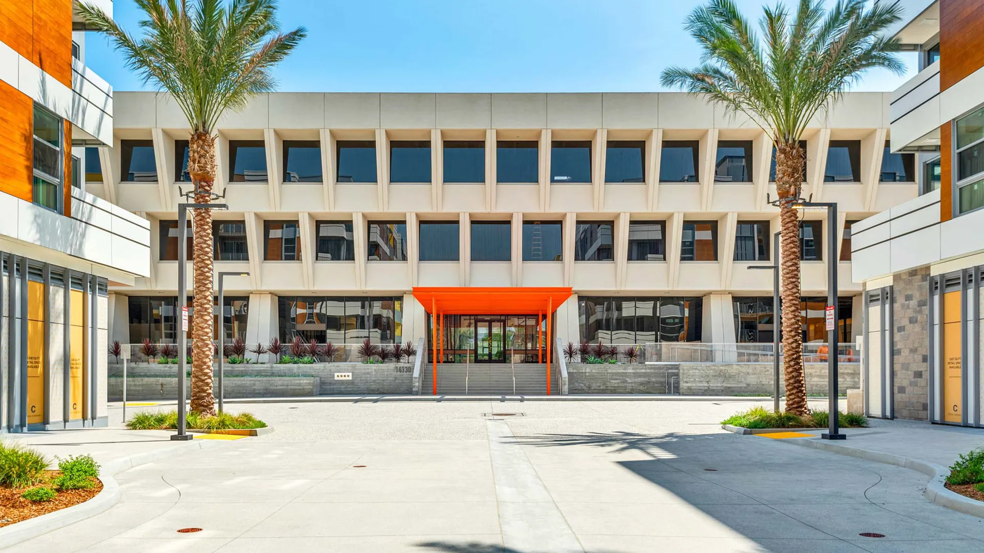 View of Sunkist building down Center Drive between the Citrus Commons luxury apartment buildings in Sherman Oaks, San Fernando Valley, Los Angeles, California.